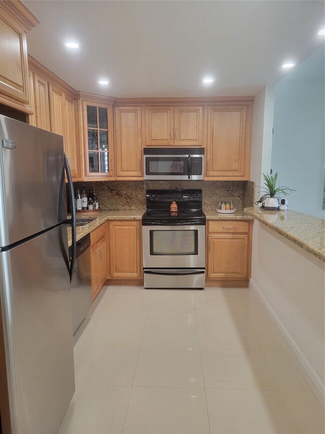 Building Photo - 19370 Collins Ave