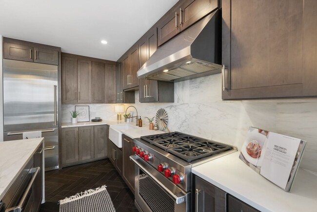 Building Photo - High-Rise Living 1st Month FREE