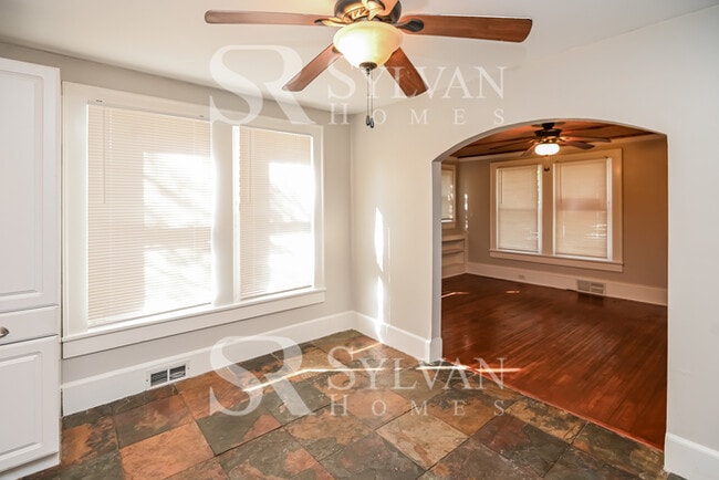 Building Photo - The living is easy in this 4 bedroom, 2 ba...
