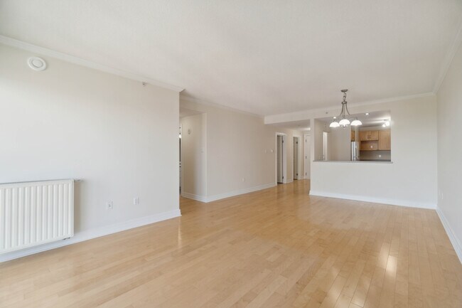 Photo du bâtiment - WELCOME TO THE SUMMIT - ONE BEDROOM PLUS DEN APARTMENT AVAILABLE
