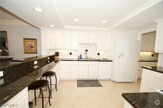 Building Photo - 6075 Pelican Bay Blvd