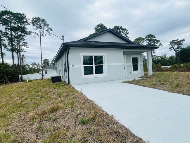 Building Photo - NEW CONSTRUCTION-  Modern 2 Bed / 2 Bath Home in South Lehigh Acres