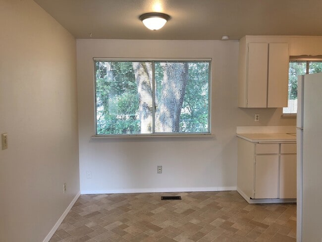 Building Photo - Clean & Move-In Ready 2-Bedroom Home with Garage and Large Fenced Yard