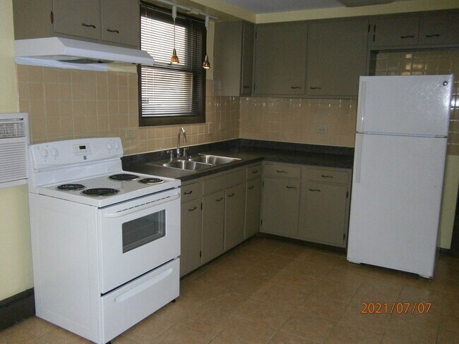 Foto del edificio - 1408 W 119th St