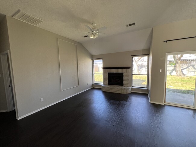 Living room with functioning fireplace - 2303 Cactus Dr