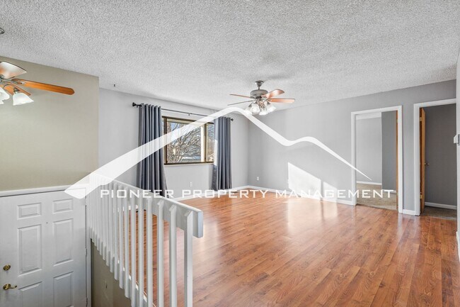 Photo - Spacious Split-Level Home in D20 with Mountain Views, 2 Car Garage, Fenced Yard and AC!