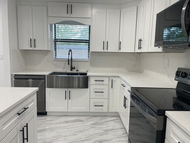 Extra Large Stainless Steel Apron Sink - 300 N Highway A1A