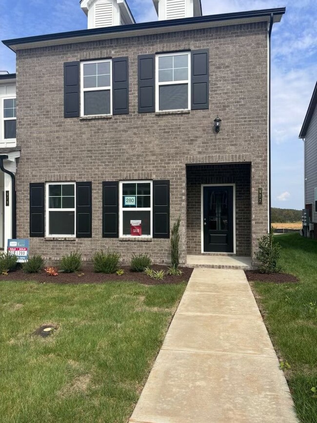 Building Photo - **BE THE LUCKY ONE TO LIVE IN THIS 2024-BUILT END-UNIT TOWNHOME IN A RESORT-STYLE COMMUNITY**