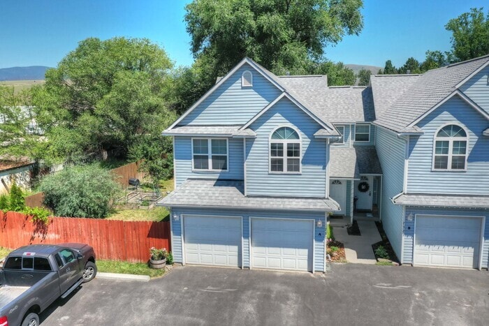 Primary Photo - Townhouse with a private yard