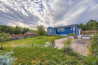 Building Photo - 8411 W 64th Pl