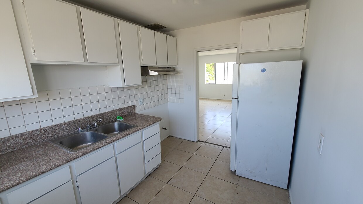Foto principal - 9915 S Avalon Blvd