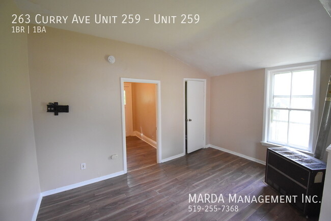 Building Photo - COZY 1-BEDROOM/1BATH MAIN FLOOR APARTMENT ...