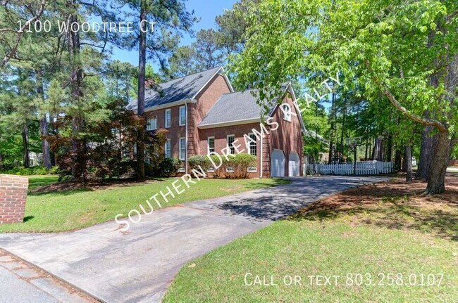 Building Photo - 1100 Woodtree Ct
