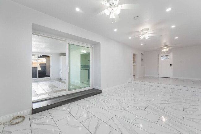 Building Photo - Single Story,  Totally Renovated , 3 bedroom, 2 bathroom Home with  extensive privacy and gated h...