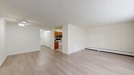Located at 20 W Montgomery Ave in Ardmore, PA, this single-floor residence offers a clean, functional layout designed for comfortable everyday living. A welcoming entry hallway with light wood-style flooring leads into the main living area, which is bright and open with neutral white walls, a textured ceiling, and a baseboard heating system. Natural light filters through multiple windows, giving the space an airy feel throughout.

The kitchen is thoughtfully arranged with warm oak cabinetry, granite-style countertops, tile flooring, and a full suite of appliances including an electric range, dishwasher, stainless steel microwave, and refrigerator — providing ample functionality for everyday cooking.

The bedrooms are carpeted for comfort, each featuring neutral tones, textured ceilings, and windows that bring in natural light. Individual wall-unit air conditioners and baseboard heaters ensure year-round climate control in each room.

Two full bathrooms serve the residence. One features a white vanity with under-sink storage, a large mirror, tile flooring, and natural light from double windows. The second bathroom includes a tub-shower combo with white tile surround, a vanity with cabinet storage, and classic mosaic tile flooring. Both bathrooms maintain a clean, bright aesthetic throughout.