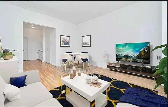 Building Photo - Large Sun Drenched One-Bedroom in the Heart of Hell's Kitchen