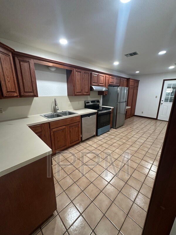 Foto del edificio - 5408 Guava Dr