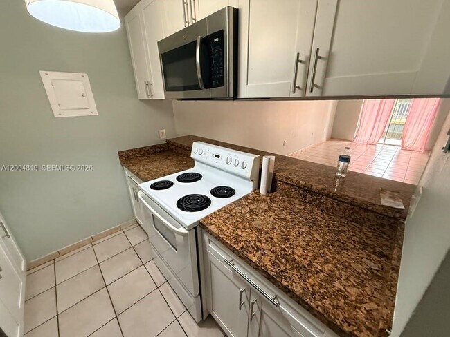 Building Photo - 1285 W 26th Pl