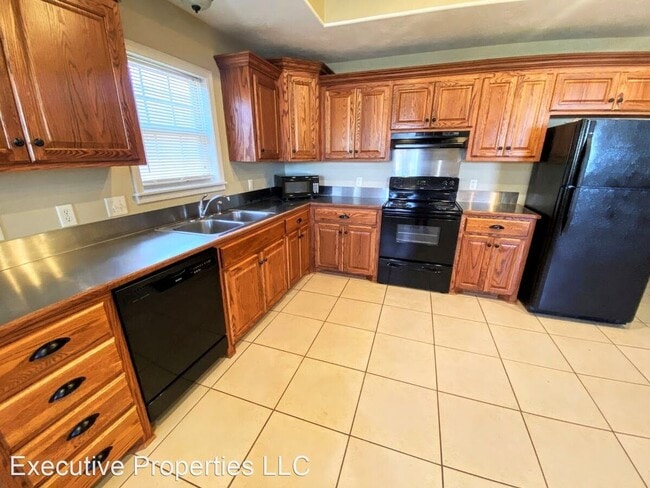 Foto del edificio - Spacious 2-Bedroom Duplex Near McNeese Sta...