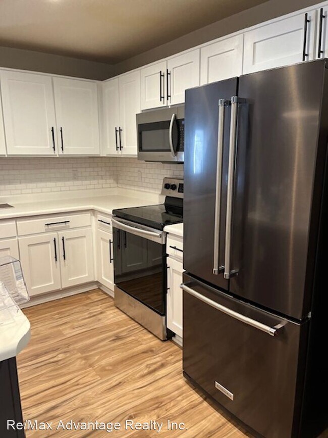 Building Photo - 3 br, 2.5 bath House - 6389 Rockville Drive