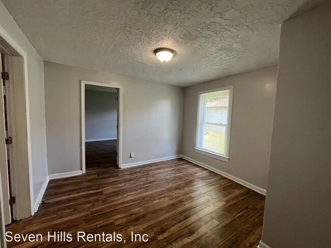 Building Photo - 4 br, 1 bath House - 1506 Cave Spring Road