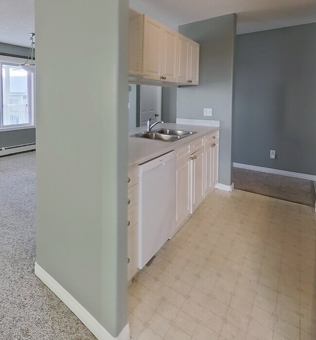 Building Photo - 9932-9100 100 Ave