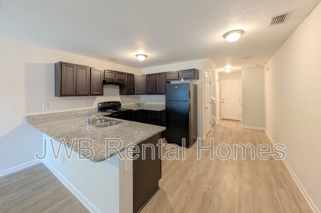 Foto del edificio - 8452 McGirts Village Ln
