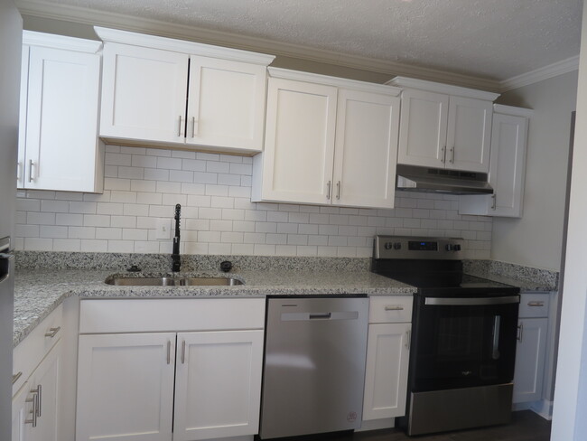 newly renovated kitchen - Deane Hill Apartments