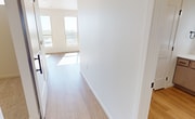 This 480 square foot apartment in Fargo, ND, is a study in efficient design and modern living. The single-floor layout maximizes space utilization, featuring one bedroom, one bathroom, and an open-concept living area. The kitchen is a standout, boasting light wood cabinetry, stainless steel appliances, and a striking geometric backsplash. Large windows flood the space with natural light, offering views of the surrounding area. The bathroom features a modern vanity with ample storage and a well-lit mirror. The bedroom, while compact at 110 square feet, includes a closet for storage. Throughout the apartment, hardwood flooring adds warmth and continuity, except for the carpeted bedroom. Recessed lighting and a neutral color palette contribute to the overall contemporary aesthetic. Despite its modest size, this apartment offers a functional and stylish living space, ideal for those seeking a low-maintenance urban lifestyle.