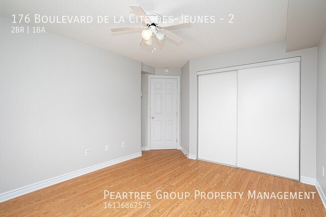 Photo du bâtiment - Charming 2 Bedroom End Unit Condo