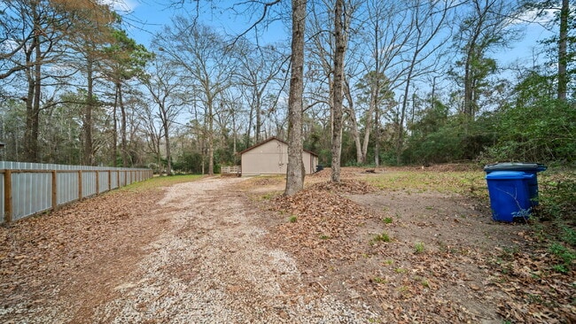 Foto del edificio - Rural, wooded living in this 4 bedroom, 2 full bath home on just under a quarter of an acre. NEW ...