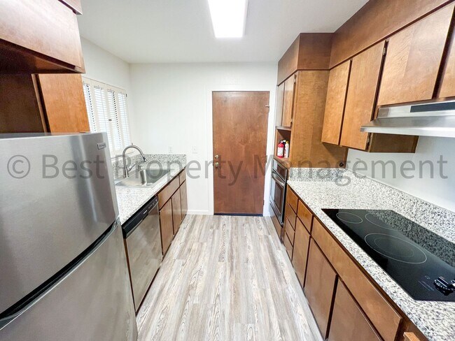Building Photo - 1-bedroom, 1.5-bathroom townhome in the he...