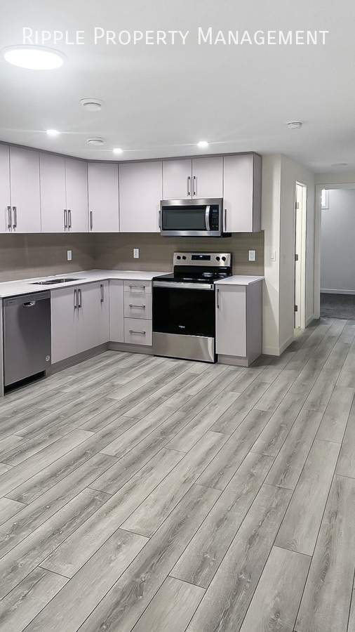 Building Photo - BEAUTIFUL 2-BED, 1-BATH BASEMENT SUITE | MODERN GLACIER RIDGE LIVING