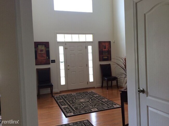 Building Photo - 4 br, 3.5 bath House - 8702 Military Post Ct