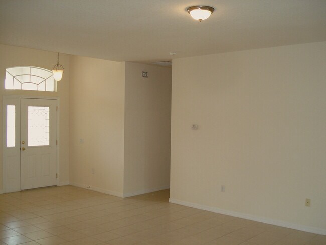Building Photo - 3/2 House in the Gated Spring Lake Village Community with Water View