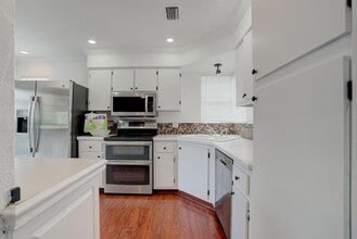 Building Photo - 6391 Riverwalk Ln