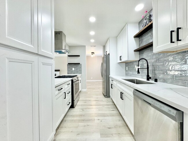 Building Photo - Beautifully Updated 4B 2.5BA House w/ Sola...