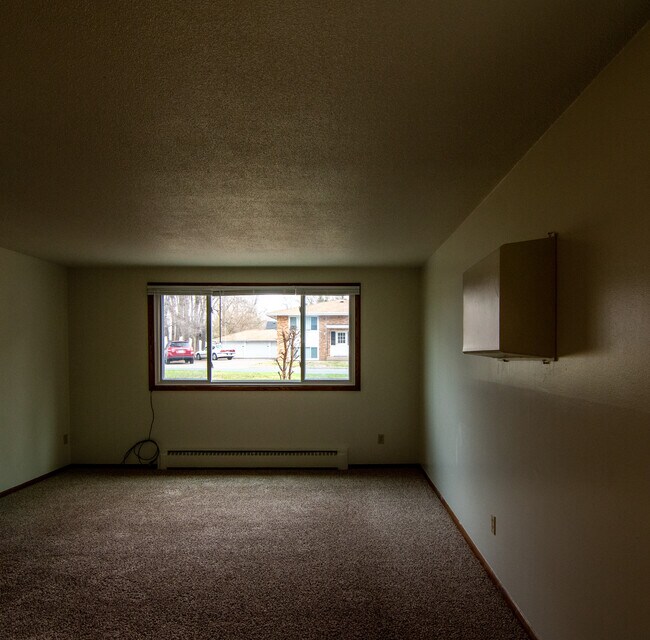 sala de estar desde el comedor - 117 Mississippi Pl