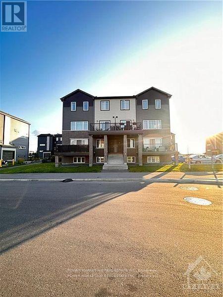 Building Photo - 704-7704 Amberwing Private