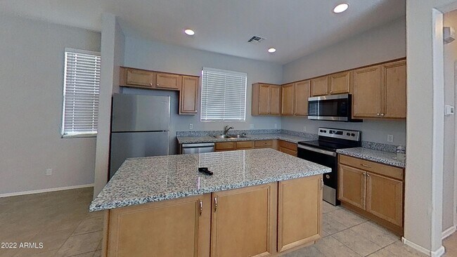 Building Photo - 14732 W Poinsettia Dr