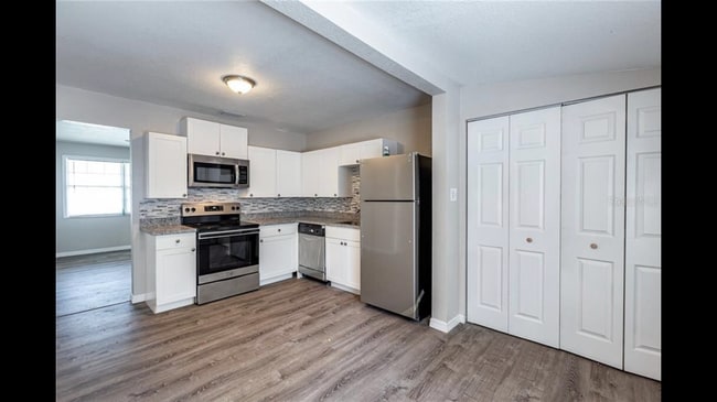 Kitchen + laundry nook - 1526 28th St N