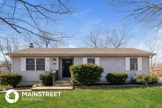 Building Photo - 1702 NE White Dr