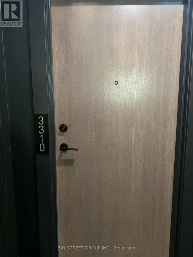 Building Photo - 55 Charles St E