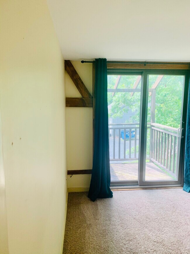 View in primary bedroom with balcony access - 7098 FERRY Rd