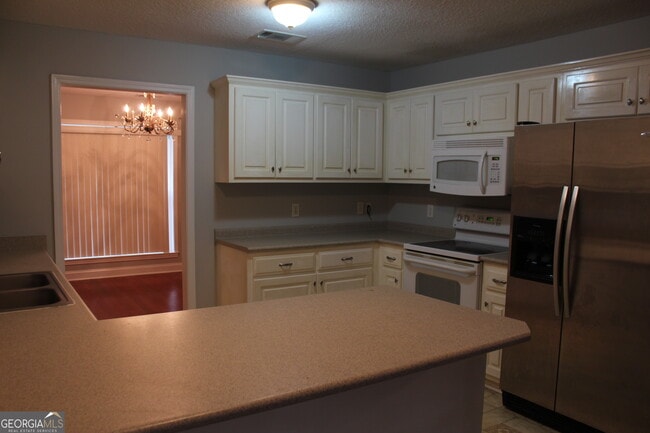 Building Photo - 8052 Burkhalter Rd