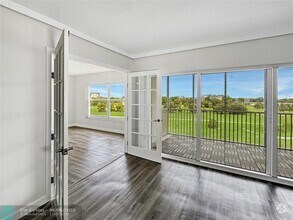Building Photo - 2950 N Palm Aire Dr