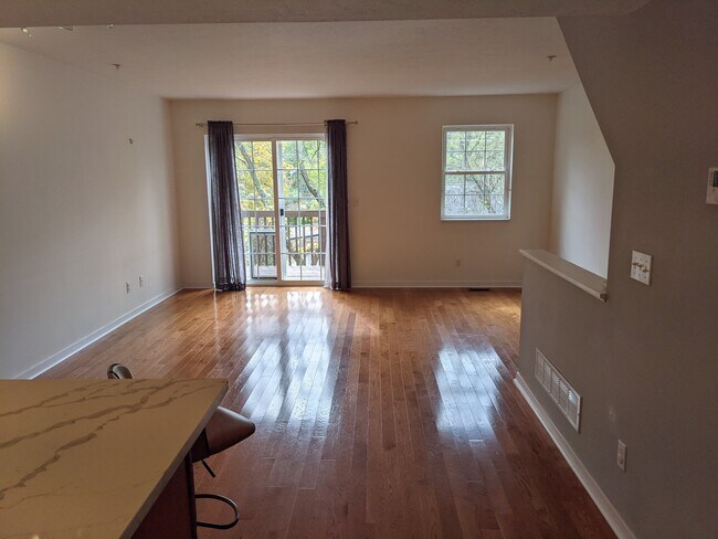 living room from kitchen - 360 Creekview Ln