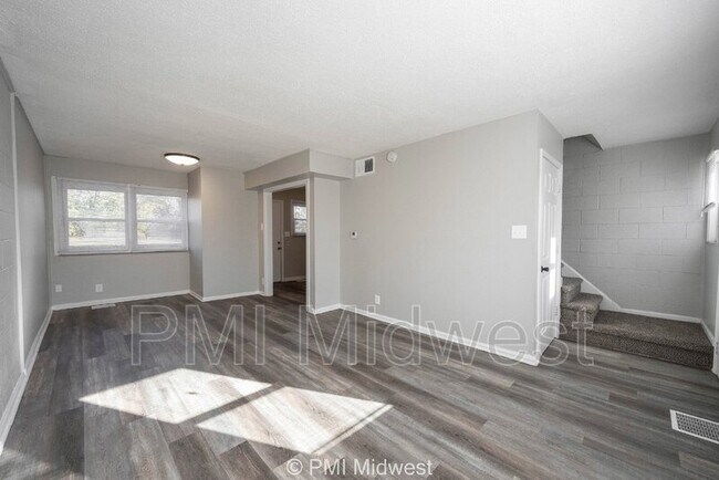 Foto del edificio - 6052 E 16th St