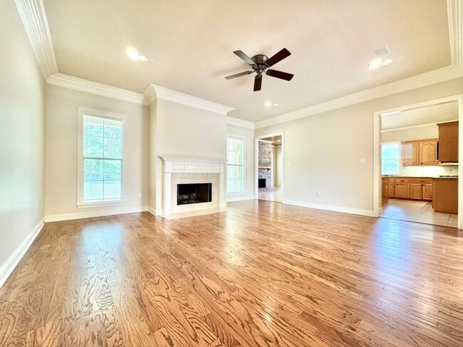Building Photo - Spacious 4-Bedroom with Fireplace & Fenced...