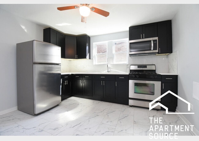 Building Photo - 5128 W Henderson St